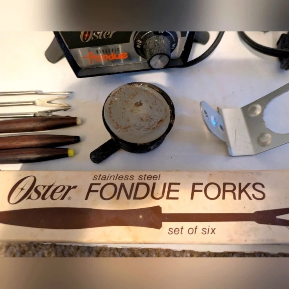 Vintage Oster Electric Fondue Set with forks.